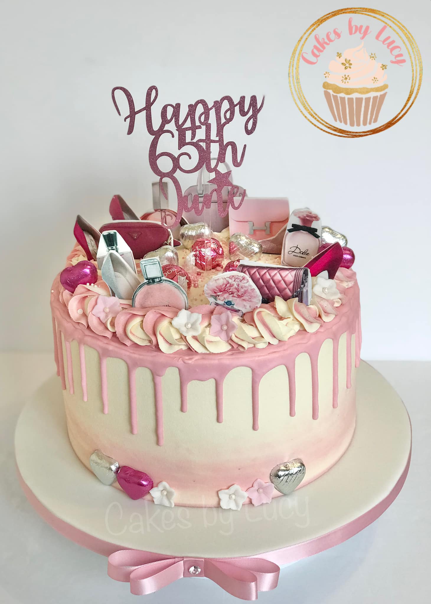 Pink Drip Cake with Perfume Bottles and Shoes