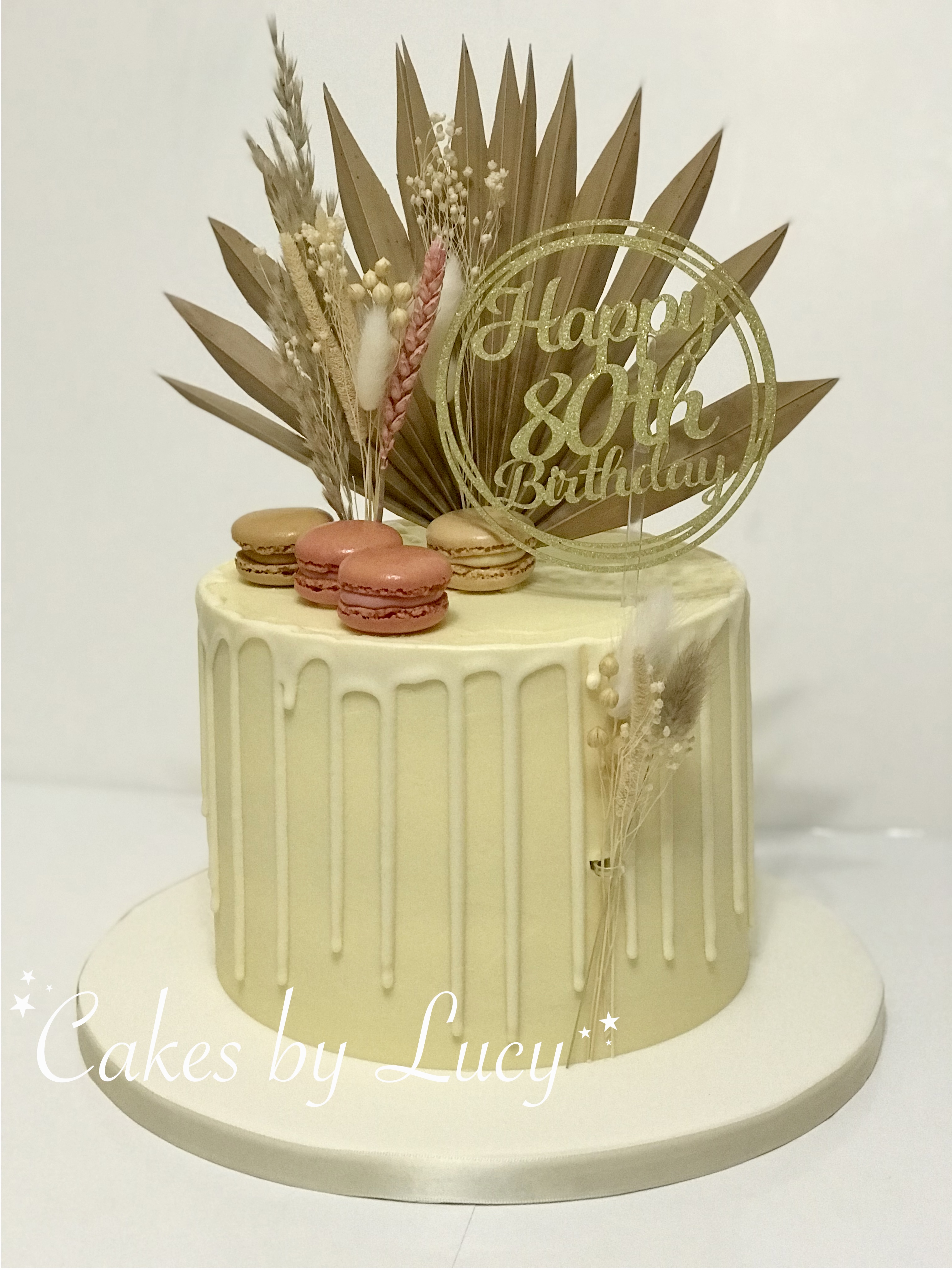 Natural drip cake with dried flowers